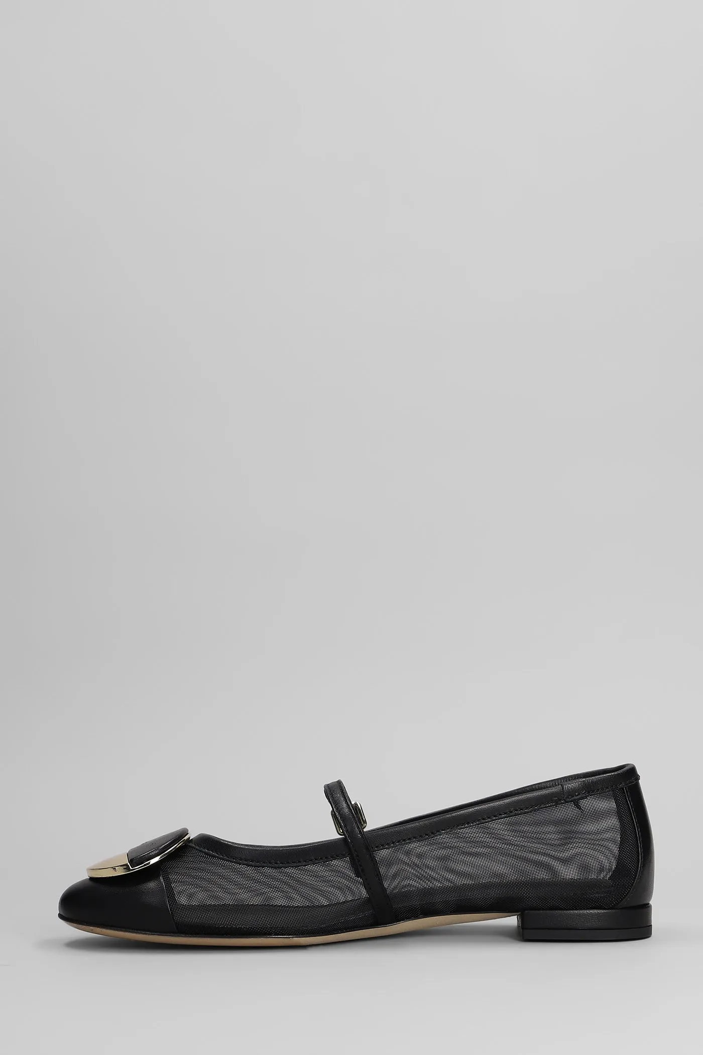Ballet flats in black leather and fabric