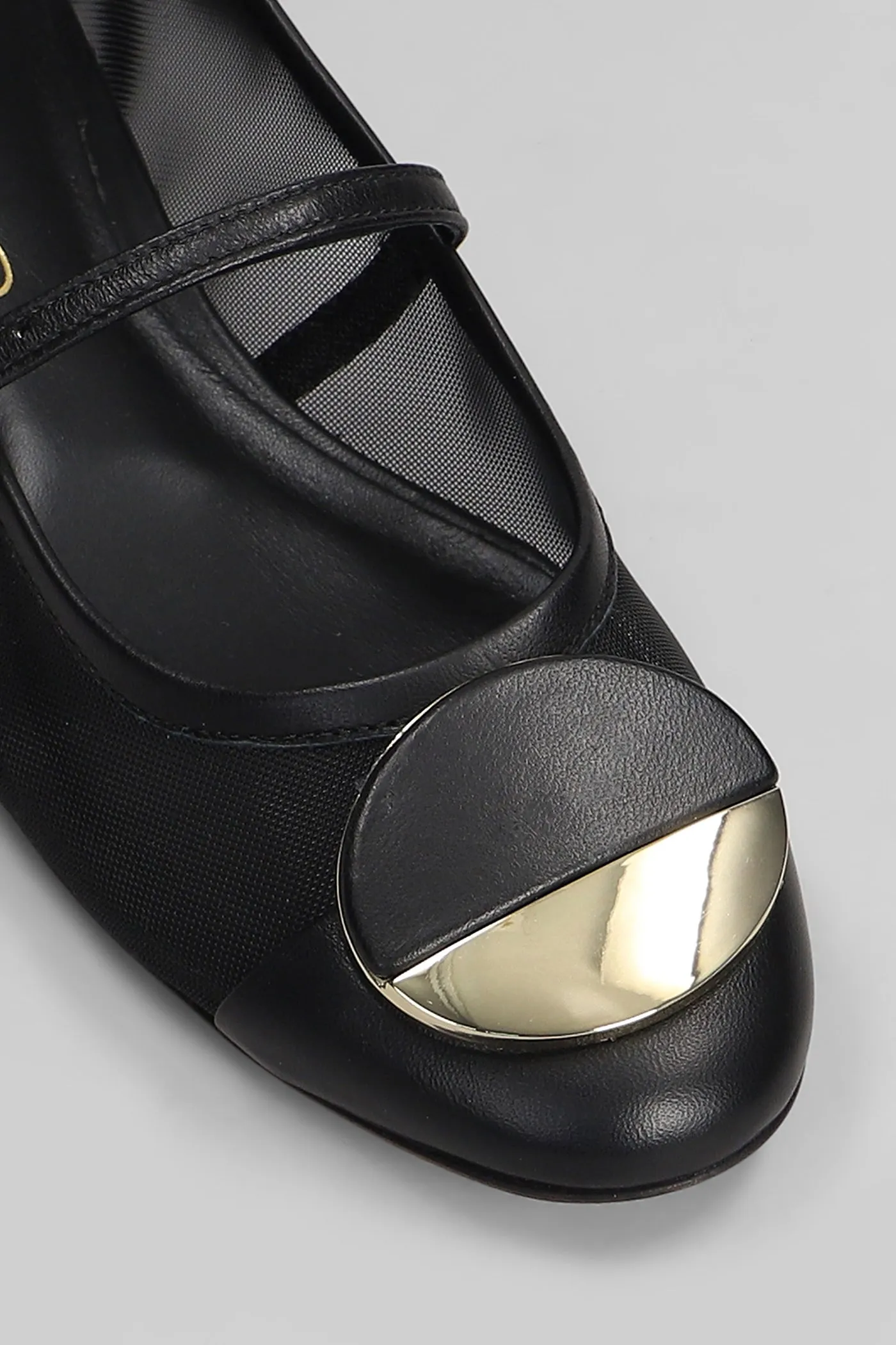 Ballet flats in black leather and fabric
