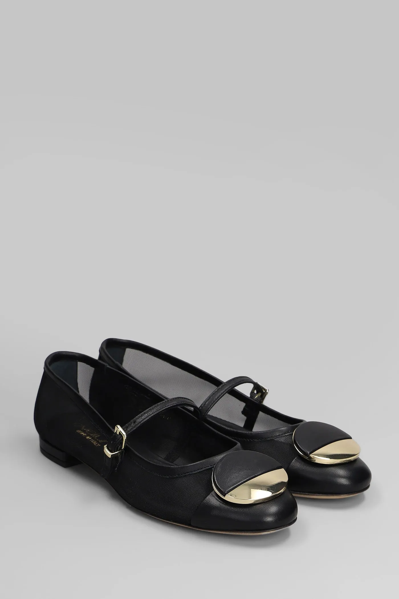 Ballet flats in black leather and fabric