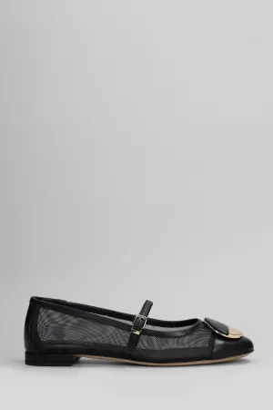 Ballet flats in black leather and fabric