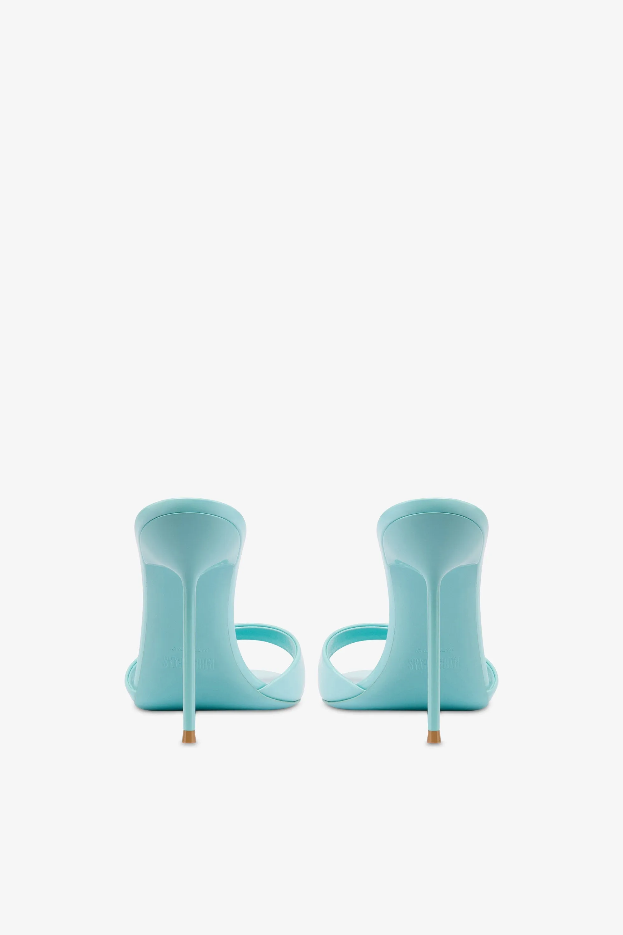 Mules in turquoise patent leather