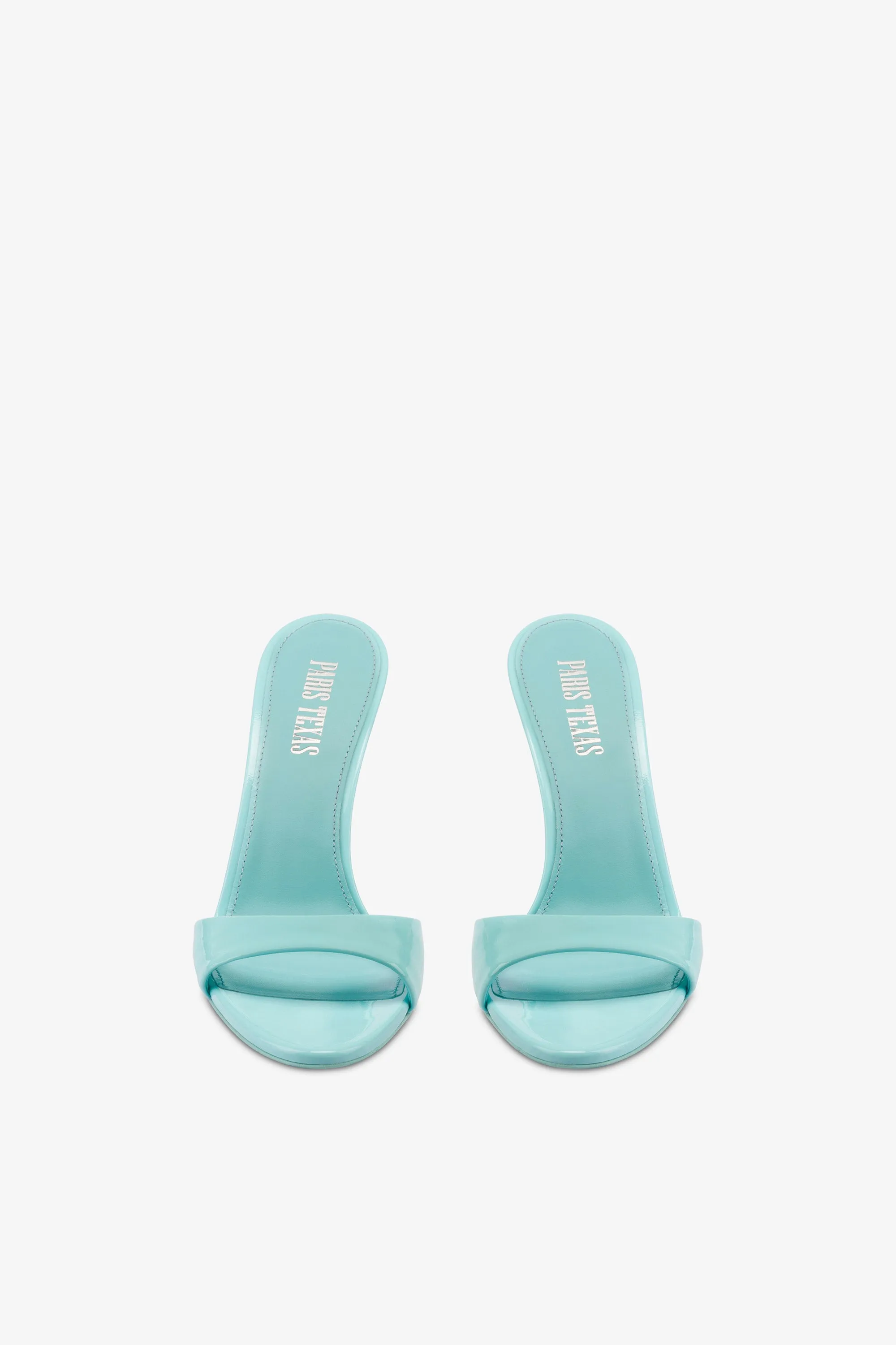 Mules in turquoise patent leather