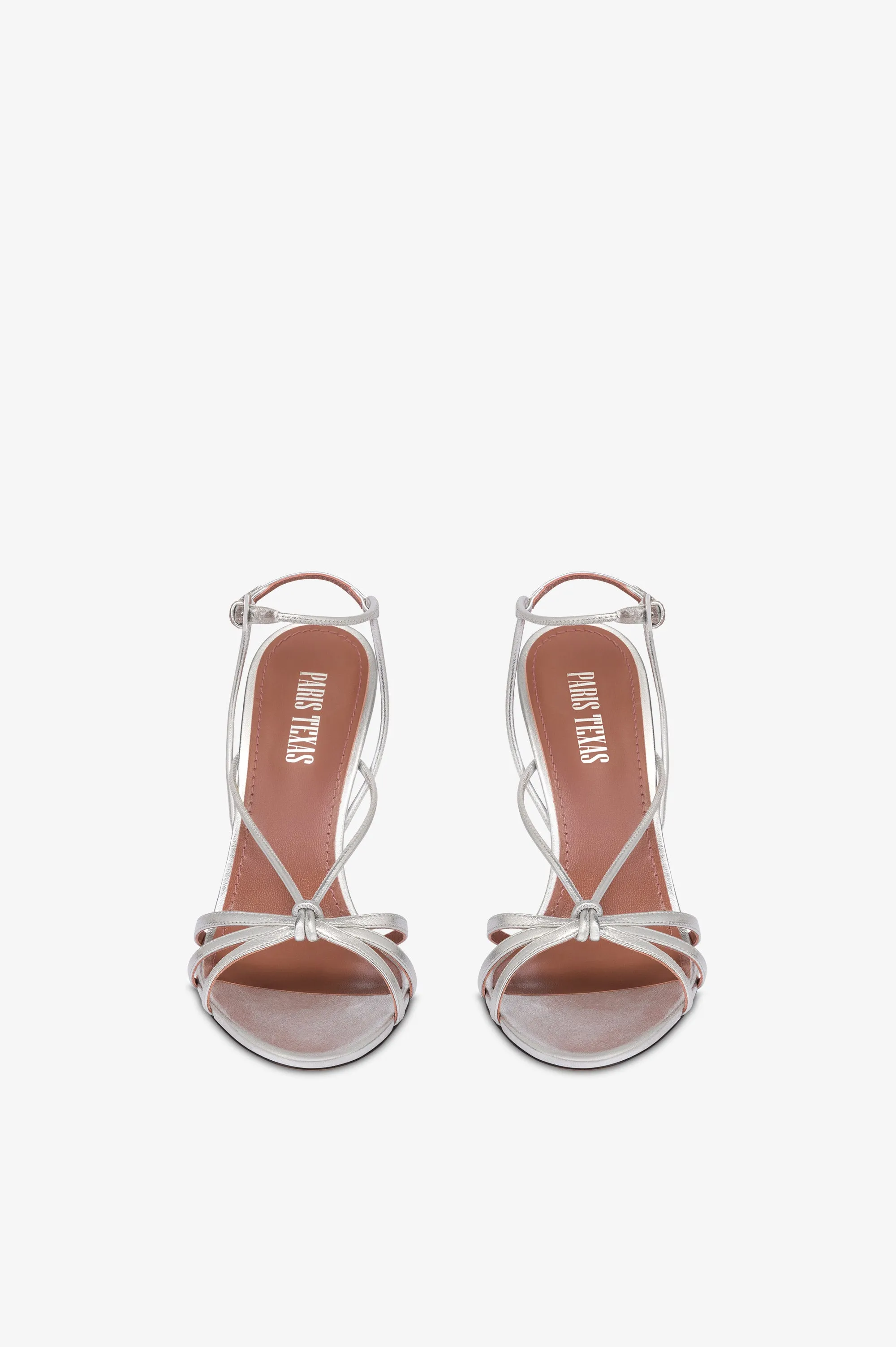 Sandals in white leather